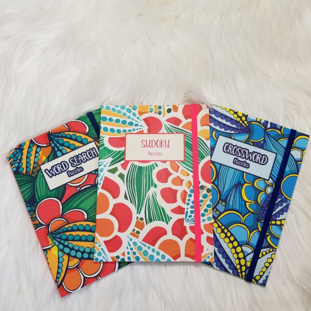4 puzzle books, sudoku, crossword, word search